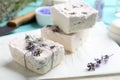 Hand made soap bars with lavender flowers on white paper Royalty Free Stock Photo