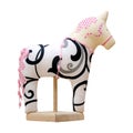 Hand made soft toy horse isolated on white with pi