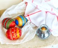 Hand made souvenir Easter eggs with embroidered patterns on kitchen table Royalty Free Stock Photo