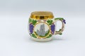 Hand made white coffee mug with gold trim and painted details