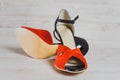 Hand-made womens dance shoes made of genuine leather on the wooden surface Royalty Free Stock Photo
