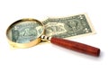 Hand magnifier over banknote Royalty Free Stock Photo