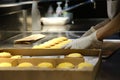 Hand making cheese tart close up. Royalty Free Stock Photo