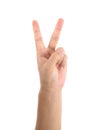 A hand making a victory sign in front of a white background Royalty Free Stock Photo