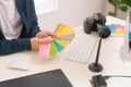 Hand of male designer working at his desk using stylus and digital graphics tablet Royalty Free Stock Photo