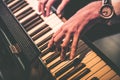 Hand of Male Pianist Gently Playing the Piano