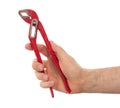 Hand of male plumber with a red wrench Royalty Free Stock Photo