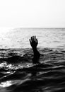 hand of man on the black ocean Royalty Free Stock Photo