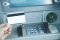 Hand of man with a credit card. ATM. Withdraw money Royalty Free Stock Photo