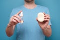 Hand of man holding cleaning germ and soap. Precautions against coronavirus Royalty Free Stock Photo