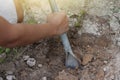 Hand of man holding a shovel to dig the soil. Royalty Free Stock Photo