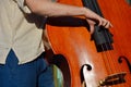 Hand of a man playing contra-bass Royalty Free Stock Photo