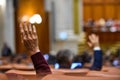 Hand raised in the air during a voting procedure Royalty Free Stock Photo