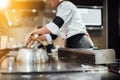 Chef cooking wagyu beef in Japanese teppanyaki restaurant