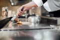 Chef cooking wagyu beef in Japanese teppanyaki restaurant