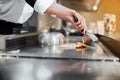 Hand of man take cooking of meat with vegetable grill Royalty Free Stock Photo