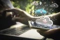 Hand man using laptop computer for doing cloud uploading data on the Internet online. Royalty Free Stock Photo