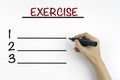 Hand with marker writing - Exercise blank list, fitness, sport, Royalty Free Stock Photo