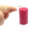 Hand, match and candle Royalty Free Stock Photo