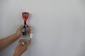 hand measureing pH in solution. research & science concept Royalty Free Stock Photo