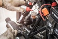 hand of Mechanic Check and Add Brake fluid to motorcycle , selective focus . auto mechanic uses to check and Maintenance Royalty Free Stock Photo