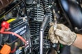 Hand of Mechanic Check and a spark plugs . maintenance selecti Royalty Free Stock Photo