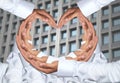 Hand of men concatenation a heart shape. Royalty Free Stock Photo