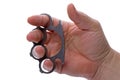 Hand with metal brass knuckles