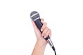 Hand with a microphone isolated on white background Royalty Free Stock Photo