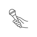 Hand with Microphone vector concept icon in thin line style Royalty Free Stock Photo