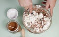 Hand mixing beaten egg whites flour chocolate