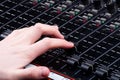 Hand on Mixing Console