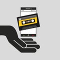 Hand mobile phone cassette audio Royalty Free Stock Photo