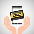 Hand mobile phone cassette audio Royalty Free Stock Photo