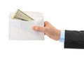 Hand and money in envelope Royalty Free Stock Photo