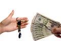 Hand with money and key on a white background Royalty Free Stock Photo