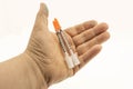 A Hand with Syringes Royalty Free Stock Photo