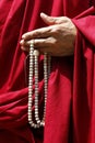 Monk holding buddhist rosary-mala-nenju