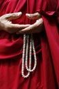 Monk holding buddhist rosary-mala-nenju
