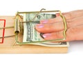 Hand and mousetrap with money Royalty Free Stock Photo