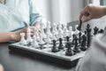 Hand move chess with strategy and tactic to win enemy, play battle on board game, business opportunity  competition strategic Royalty Free Stock Photo