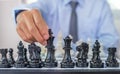 hand moves chess with strategy and tactic to win enemy, play battle on board game, business opportunity competition strategic