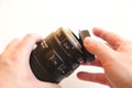 Hand moving lens cap Royalty Free Stock Photo
