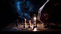 Hand moving strategic chess on smoke chess board for business concept.
