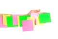 Hand and multicolored note paper Royalty Free Stock Photo