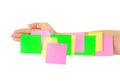 Hand and multicolored note paper