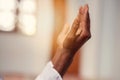 Hand of muslim black man people praying with mosque interior background