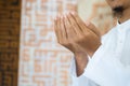 Hand of muslim people praying. Muslim islam man in white session lift two hand for praying. Concept for islamic pray, Ramadan, Eid