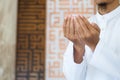 Hand of muslim people praying. Muslim islam man in white session lift two hand for praying. Concept for islamic pray, Ramadan, Eid