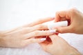 Hand and Nail Care. Beautiful Women`s Hands with Perfect Manicure. Manicure Master Holding Cotton Pads in Hands. Beauty Day. Spa Royalty Free Stock Photo